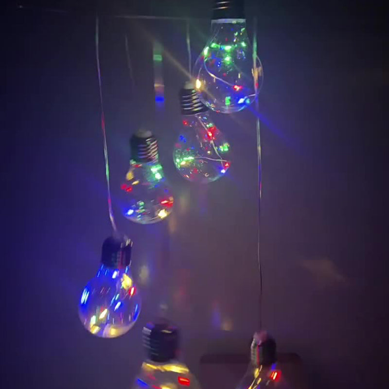 Färgglada LED-solcellsdrivna vindspel med glödlampa