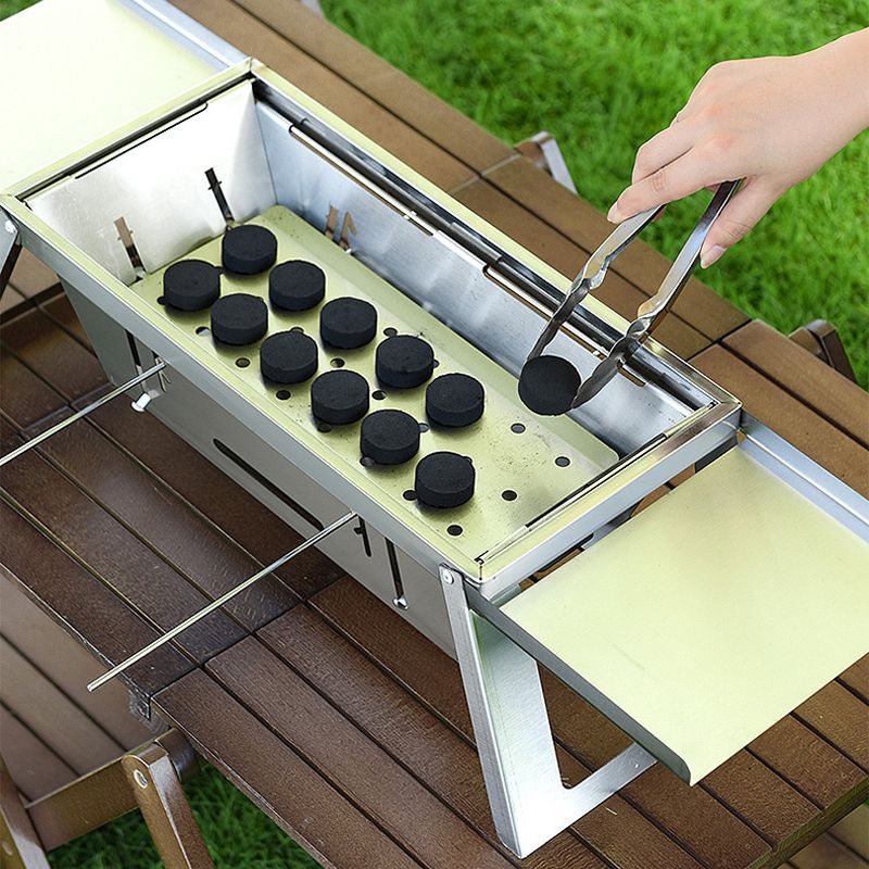 đ„Den hopfĂ€llbara utomhusgrillen i rostfritt stĂ„l