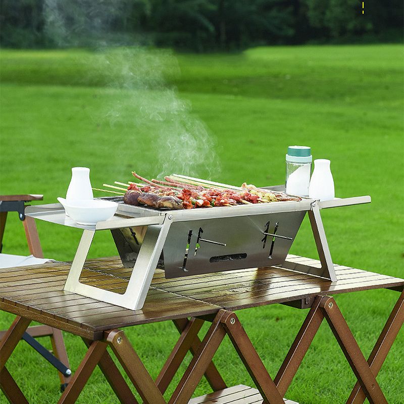 đ„Den hopfĂ€llbara utomhusgrillen i rostfritt stĂ„l