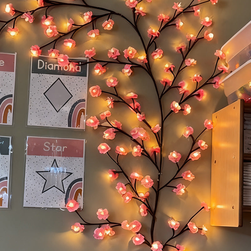 Blommiga vinrankor som stämningsbelysning