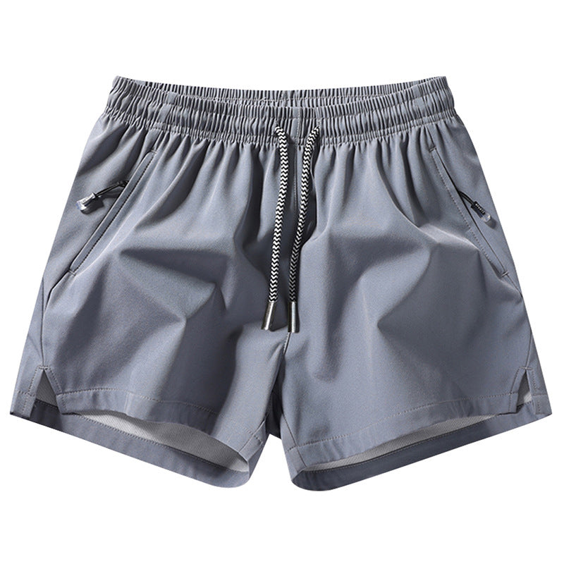 Snabborkande sportshorts för herr med fickor med dragkedja