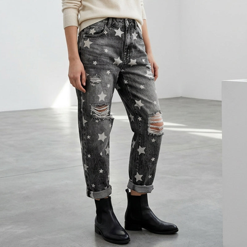 Dammjeans med stjärnmönster, slitna och hög midja