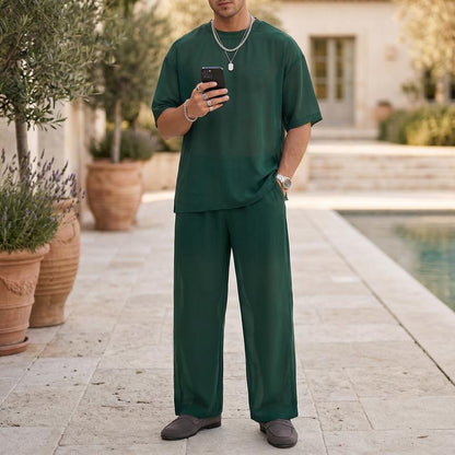 2-delat set med T-shirt och byxor med vida ben för män