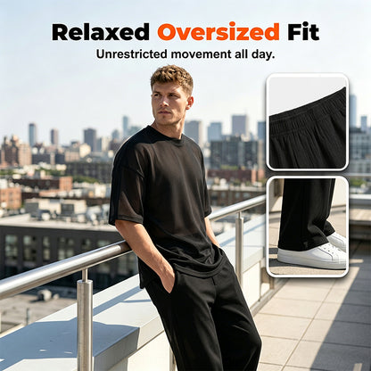 2-delat set med T-shirt och byxor med vida ben för män