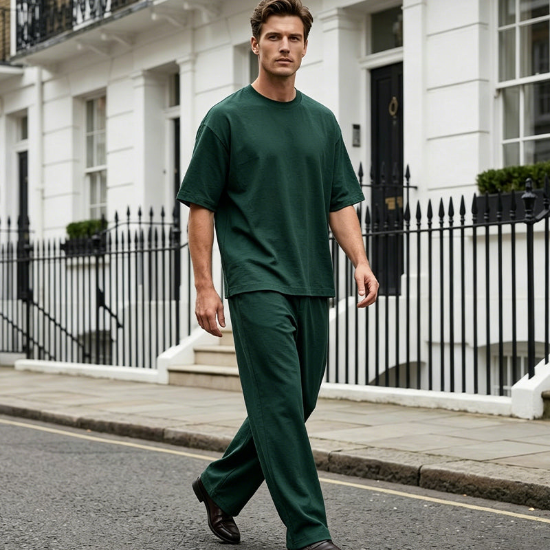2-delat set med T-shirt och byxor med vida ben för män