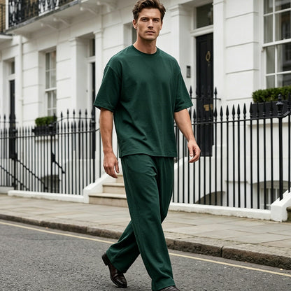 2-delat set med T-shirt och byxor med vida ben för män