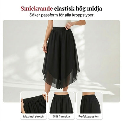 Asymmetriska chiffongbyxor med vida ben för dam