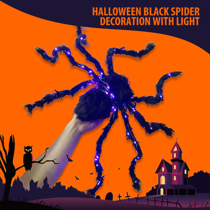 Halloween-dekoration med svart spindel och ljus
