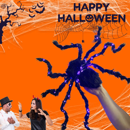 Halloween-dekoration med svart spindel och ljus