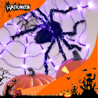 Halloween-dekoration med svart spindel och ljus