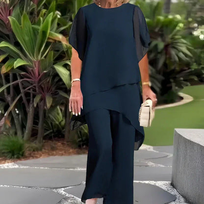 ✨60% RABATT – Charmigt set med oregelbunden topp 👗 Elegant set med vida byxor – Bekväma och perfekta för våren