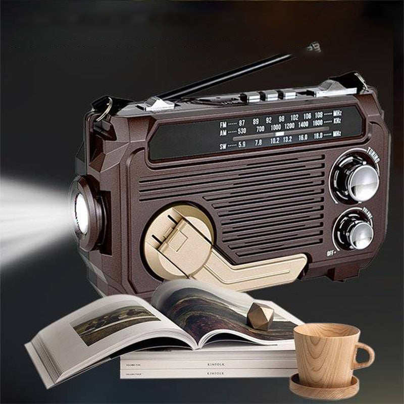 Multifunktionell handvevd bärbar radio med ficklampa