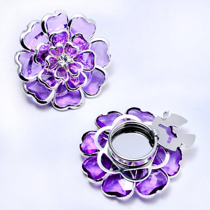 Elegant manschettknapp och brosch med strass och blommönster