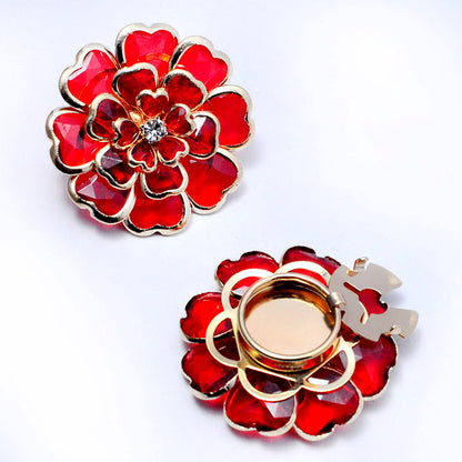 Elegant manschettknapp och brosch med strass och blommönster