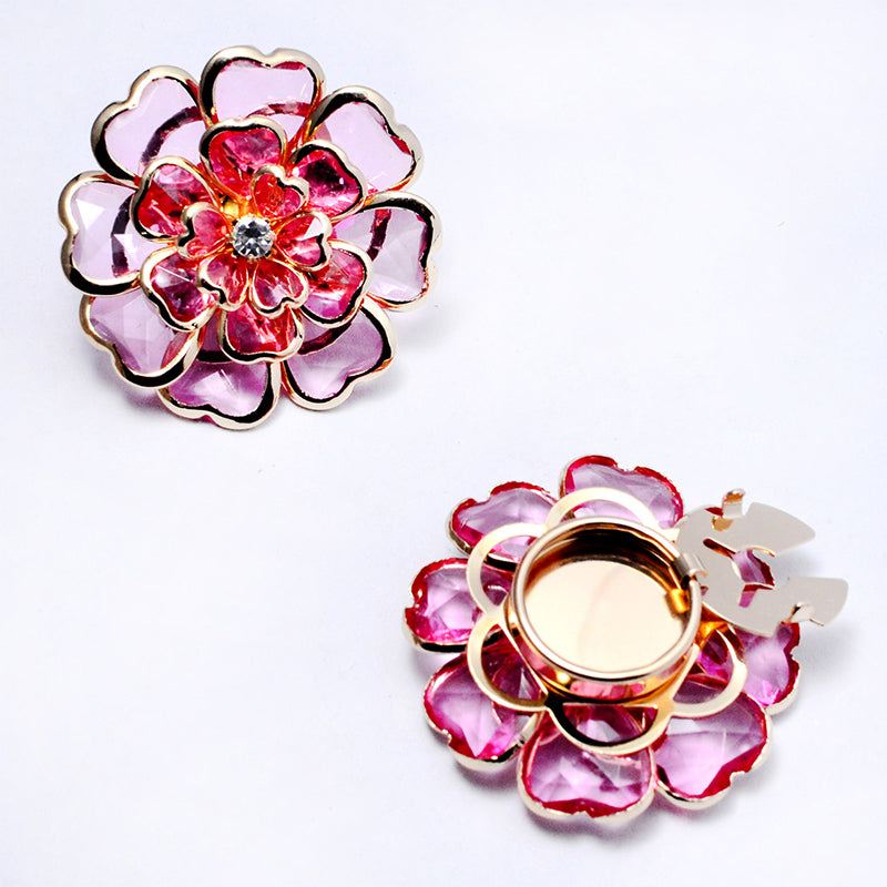 Elegant manschettknapp och brosch med strass och blommönster