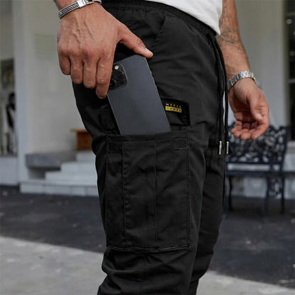 👖50 % RABATT🏃 Arbetsbyxor i fleece | Dragsko i midjan · Slitstarkt polyester · Avsmalnande ben · Flera fickor