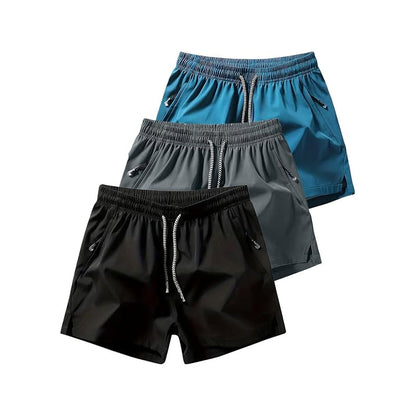 Snabborkande sportshorts för herr med fickor med dragkedja