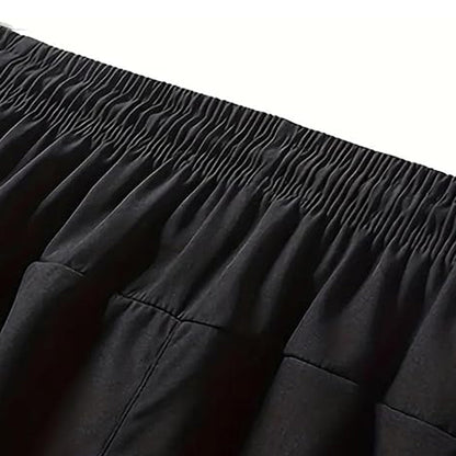 Snabborkande sportshorts för herr med fickor med dragkedja