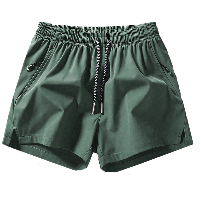Snabborkande sportshorts för herr med fickor med dragkedja