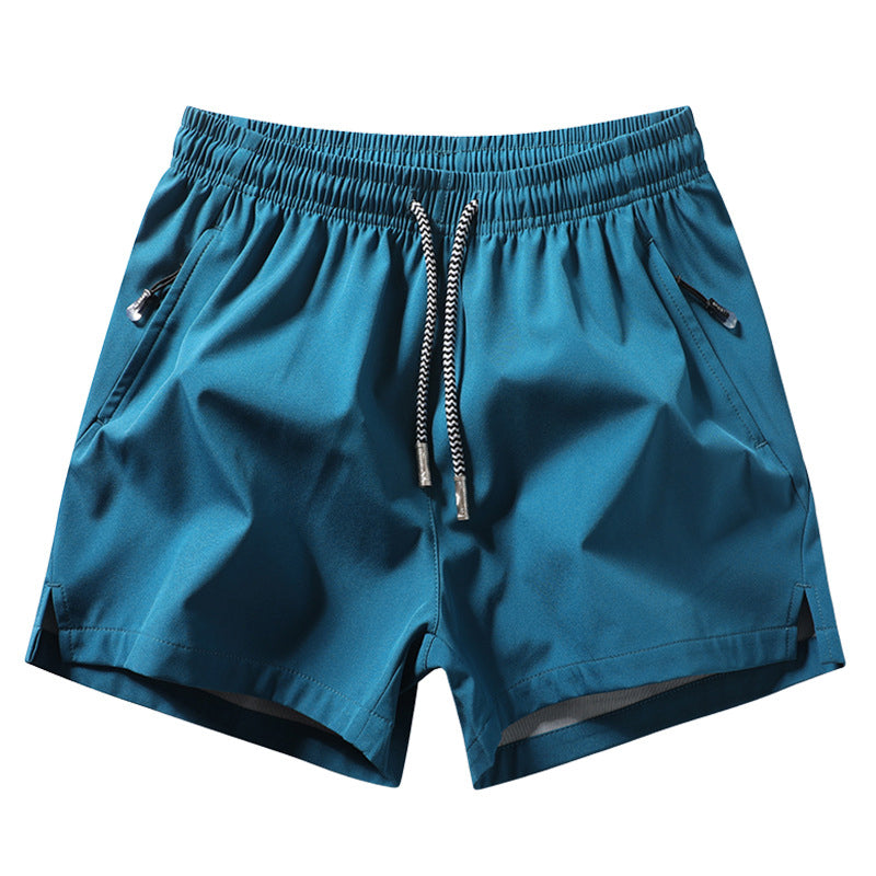 Snabborkande sportshorts för herr med fickor med dragkedja