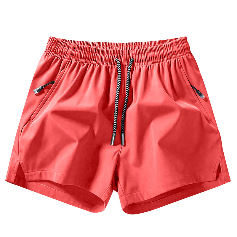 Snabborkande sportshorts för herr med fickor med dragkedja