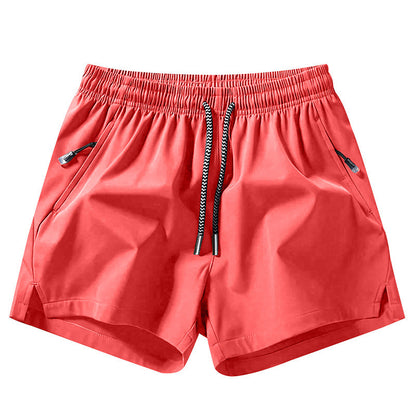 Snabborkande sportshorts för herr med fickor med dragkedja