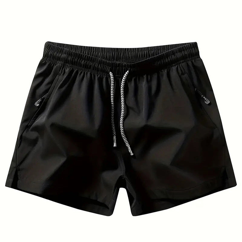 Snabborkande sportshorts för herr med fickor med dragkedja