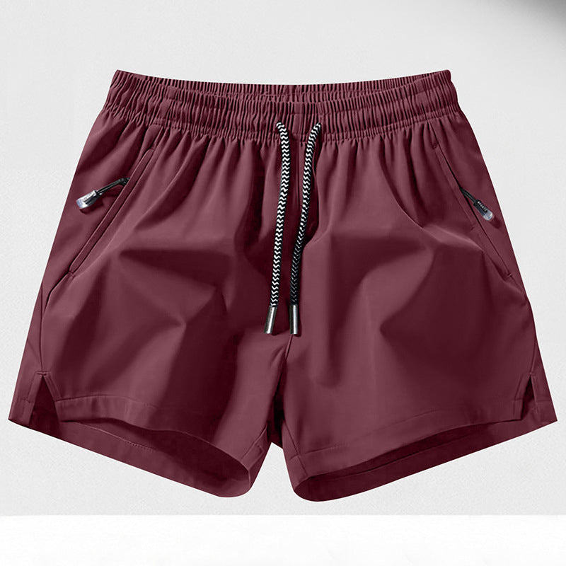 Snabborkande sportshorts för herr med fickor med dragkedja