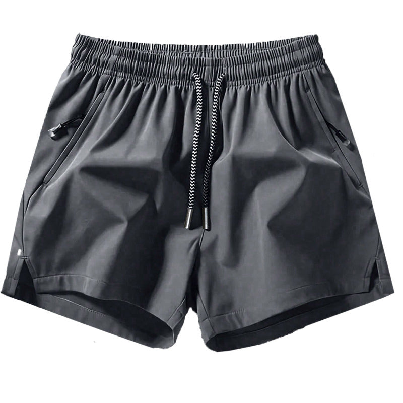 Snabborkande sportshorts för herr med fickor med dragkedja