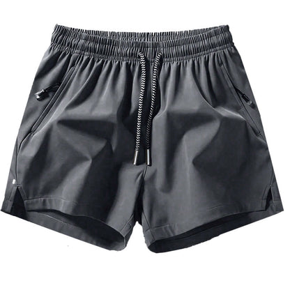 Snabborkande sportshorts för herr med fickor med dragkedja
