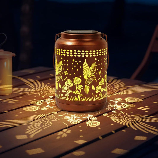 Solar kolibri lantern för trädgårdsinredning