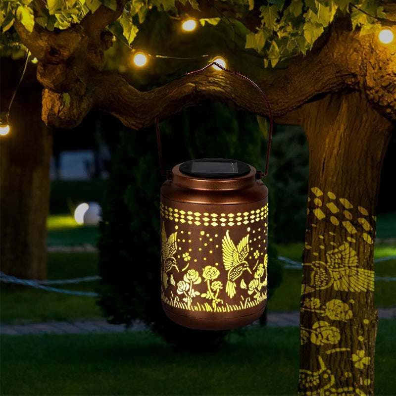 Solar kolibri lantern för trädgårdsinredning