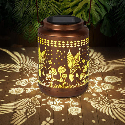 Solar kolibri lantern för trädgårdsinredning