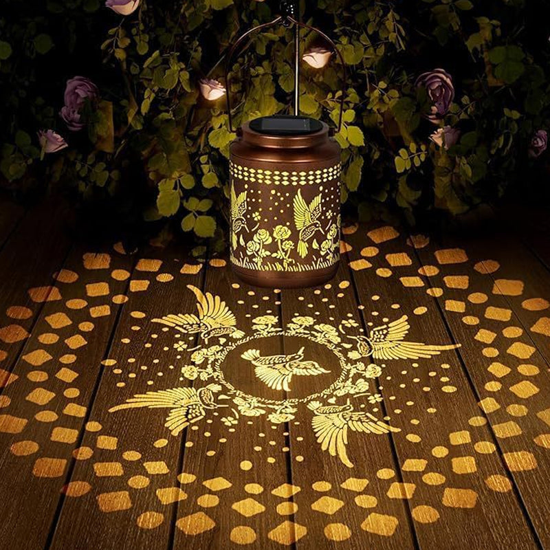 Solar kolibri lantern för trädgårdsinredning