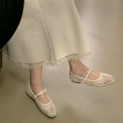 Eleganta ballerinaskor i mesh med rosett