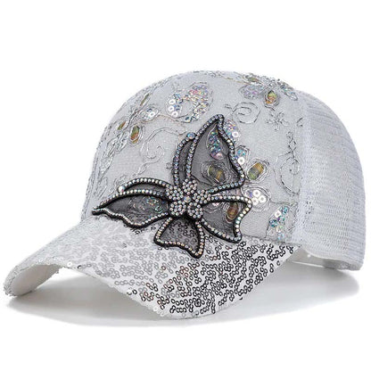 Baseballkeps med fjärilsmotiv i strass och paljetter