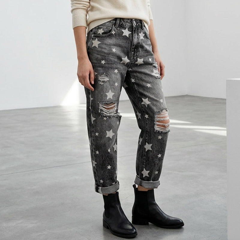 Dammjeans med stjärnmönster, slitna och hög midja