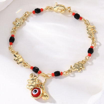 Bohemiskt Onda Ögat Armband – Elefant & Hamsa-berlockare, Guldfärgat, Justerbart ✨