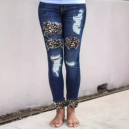 Skinny-jeans för dam med leopardmönster och slitningar