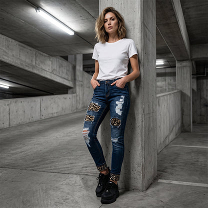 Skinny-jeans för dam med leopardmönster och slitningar