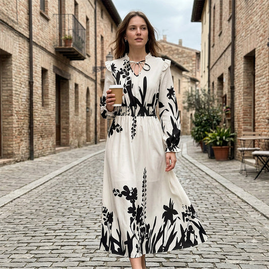 Elegant maxiklänning med blommönster för dam
