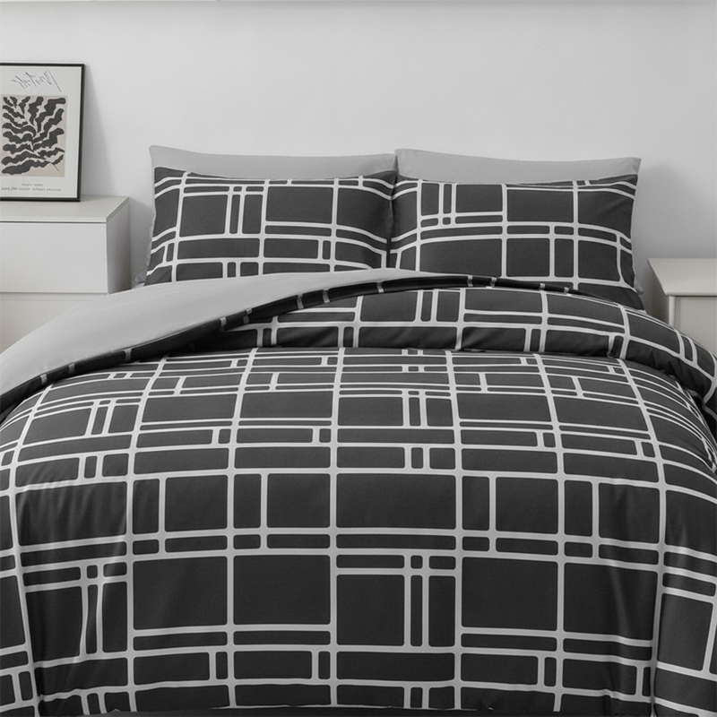 Moderna, minimalistiska sängkläder med geometriska mönster