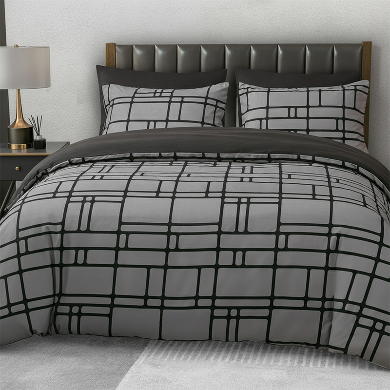 Moderna, minimalistiska sängkläder med geometriska mönster