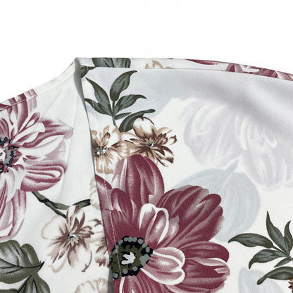 Damtopp med blommigt tryck och lös passform