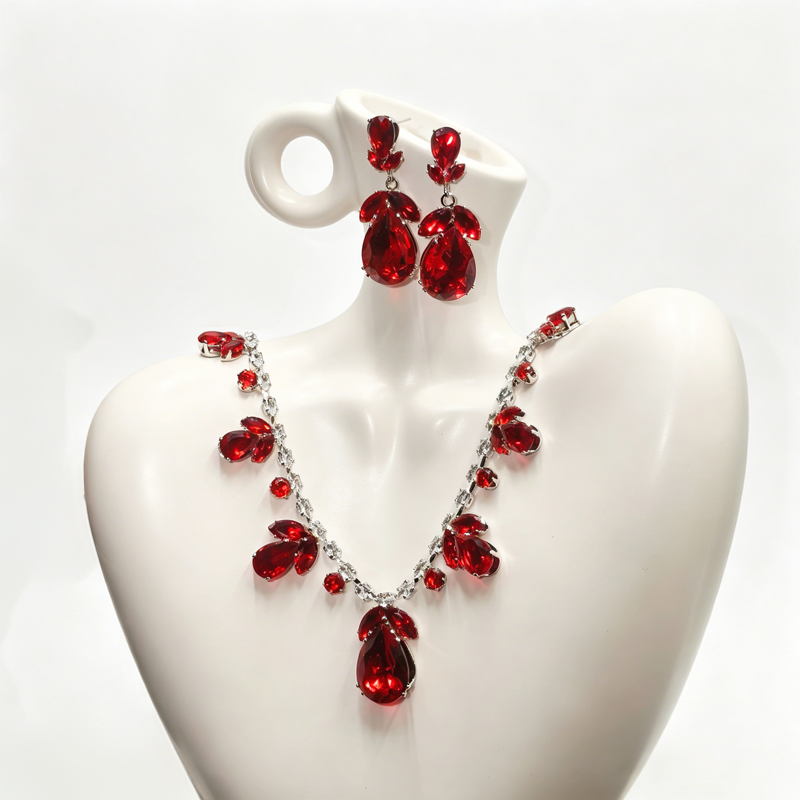Elegant set med halsband och örhängen med tulpanmotiv