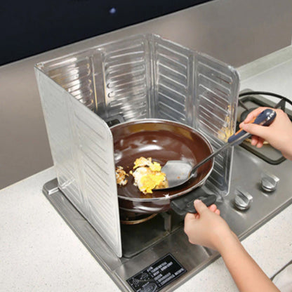 ⭐MISSA INTE 50% RABATT!🍳🔥 Stoppa oljestänk innan det träffar dina väggar — detta vikbara skydd fångar fett, torkas rent på sekunder och förvaras plant. Ingen skrubbning, ingen röra, inga ånger. 🛡️